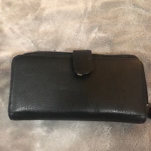 NWOT ROOTS leather wallet.